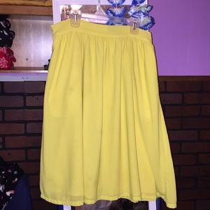 Yellow skirt.